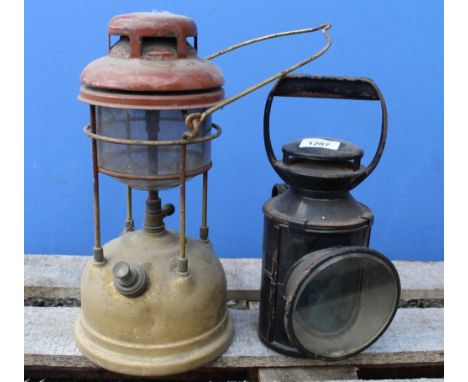 Brass bodied tilly lamp and a layman's tricolour lenses lamp (2) 