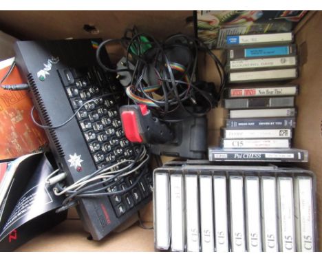 Sinclair ZX Spectrum console and a quantity of games including Frankie, The Incredible Hulk, Spy vs Spy, with instructions an