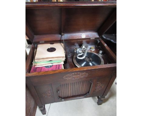 Geisha wind up oak cased cabinet Gramophone, with tambour speaker door, W82cm D49cm H86cm 