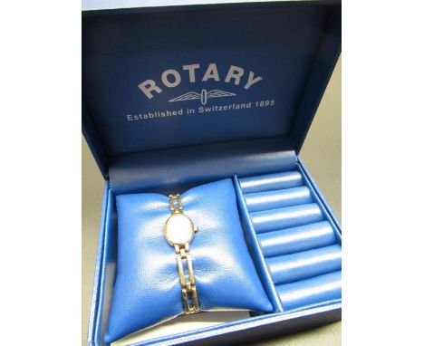 Ladies Rotary 9ct gold quartz cocktail watch, signed mother of pearl dial, oval case on matching gate type bracelet, no visib