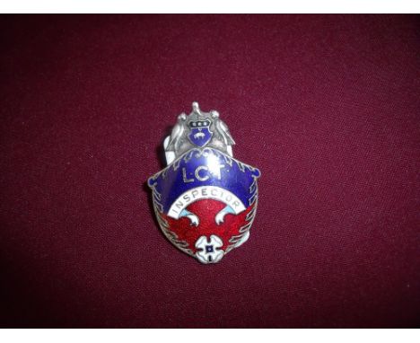 Scarce L.C.T (Leeds City Transport) Inspectors white metal and enamel cap badge 