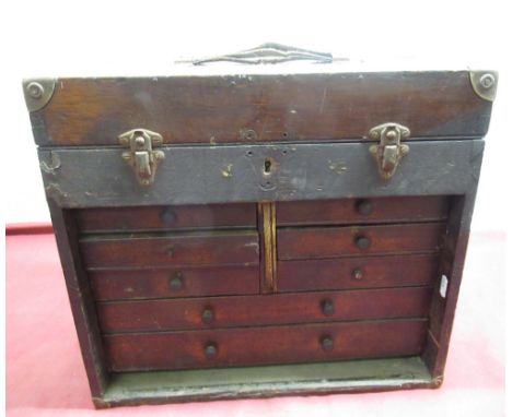 Early C20th mahogany watch makers tool makers cabinet (lacking front) six short and two long drawers containing miscellaneous