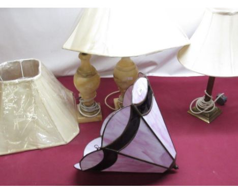 Tiffany style pink and burgundy marbleised lamp shade, two alabaster table lamps with shades, brass Corinthian column table l