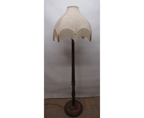 Geo.lll Corinthian style column standard lamp with circular base and a silk fringe shade, H180cm