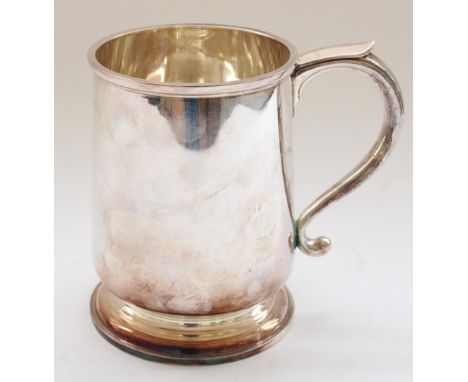 Geo.VI hallmarked silver tankard of baluster form with S scroll handle on stepped pedestal base.  Sheffield 1944, Atkin Bros.