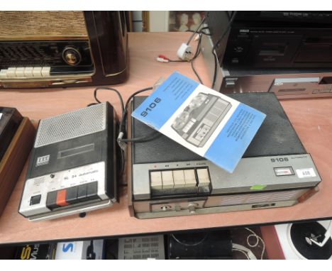 A vintage reel to reel recorder, possibly Philips and an ITT cassette recorder