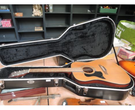 A Tanglewood TW28ST acoustic guitar, left handed, serial label, 34101514, in TGI hard case