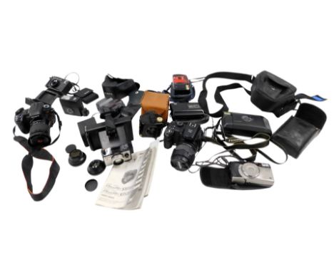 Various camera equipment, to include a Sony A300 film camera with lens, a Fujifilm Finepix S9500, etc.