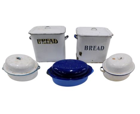 A white and navy blue enamel bread bin and cover, another similar, and various enamel pans. 