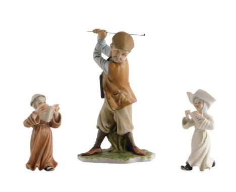 A Capodimonte porcelain figure of a gentleman golfer, 28cm high, and a pair of Capodimonte figures of a monk and a nun. (AF)