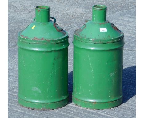 A pair of early 20thC green painted Castrol motor oil 10.5 containers.