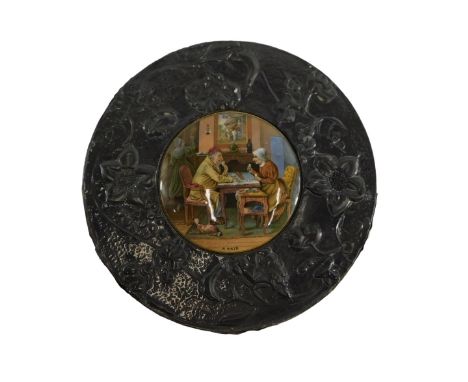 A 19thC Prattware pot lid, a pair, in hammered and embossed Arts &amp; Crafts pewter frame, in the manner of Liberty, 21.5cm 