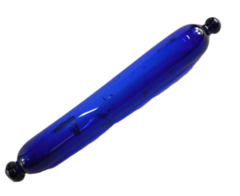 A 19thC Bristol Blue rolling pin, with indistinct decoration, possibly of a ship, 38cm wide. 