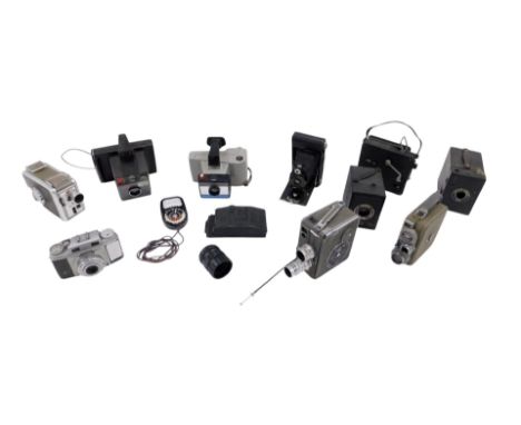 A quantity of cameras, to include a Campro cine camera, a Eumig cine camera, bellows camera, etc. 