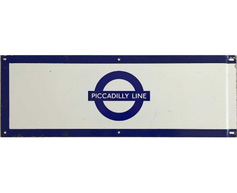 London Underground 1950s/60s enamel STATION FRIEZE PLATE for the Piccadilly Line with the line name on the bar of a tradition