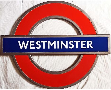 London Underground enamel PLATFORM ROUNDEL SIGN from Westminster station. A modern "silhouette" roundel in an integral allumi