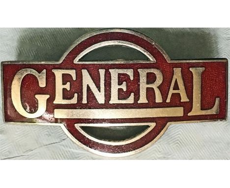 London "General" Omnibus Co CAP BADGE in maroon enamel in the Underground Group 'bar & circle' design. It is thought that the