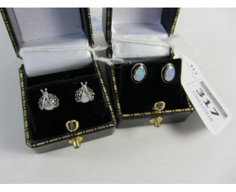 Pair of pearl and marcasite ladybird ear-rings and a pair of opal ear-rings both stamped 925