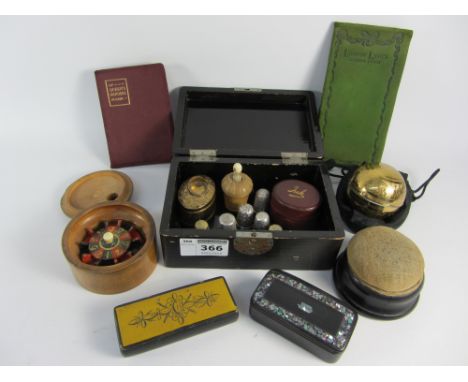 Lacquered box containing hallmarked silver thimbles, inkwell, Stanhope tape measure, pocket roulette, early 19th century papi