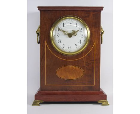 Edwardian inlaid figured mahogany mantle clock, fitted with lion mask handles and brass bracket feet, H24cm