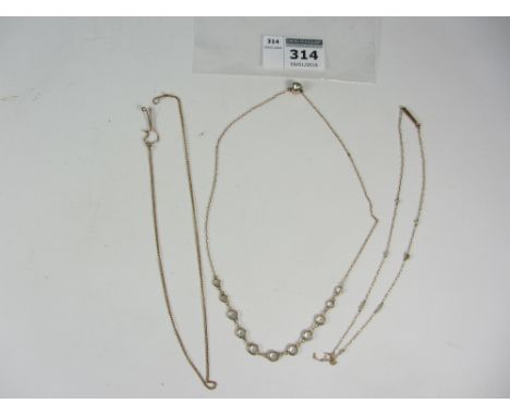 Crystal set chain necklace stamped, seed pearl necklace and one other