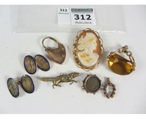 Cameo brooch stamped 9ct, citrine revolving fob hallmarked 9ct, pair blue enamel and gold cuff-links stamped 9ct, hunting dog