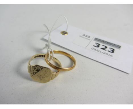 22ct gold wedding band approx 2,4gm and a 9ct gold signet ring approx 2.6gm both hallmarked