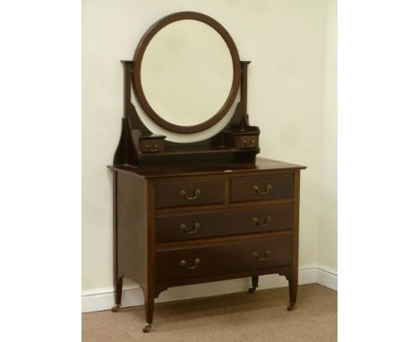 Edwardian mahogany dressing chest, circular bevelled edge swing mirror above two trinket drawers, fitted with two short and t
