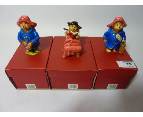 Three Paddington Bear Hidden Treasures trinket boxes - 'Paddington with Suitcase', 'Paddington in Bed' and 'Paddington with M