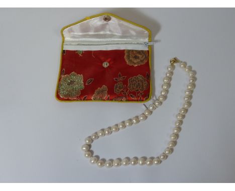 South sea pearl necklace, the clasp stamped 14K
