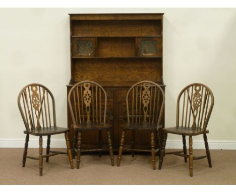 20th century oak two drawer and two cupboard dresser fitted with two heights plate rack, two cupboards enclosed by lead glaze