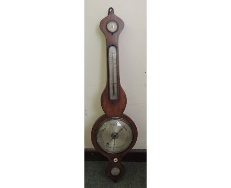 A 19th Century mahogany wheel barometer named "Rossiter Bridgwater" at the base and with hygrometer and thermometer set to th
