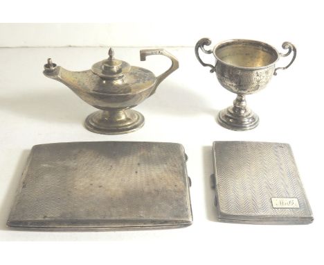 A silver cigarette case, hallmarked Birmingham 1929, another smaller, hallmarked London 1929, a small twin handled trophy cup