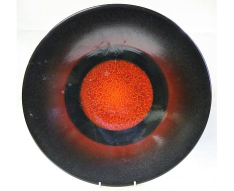 A Poole Pottery "The Planets" wall charger.  to mark the alignment of the planets 5/5/2000.  This particular pattern called '