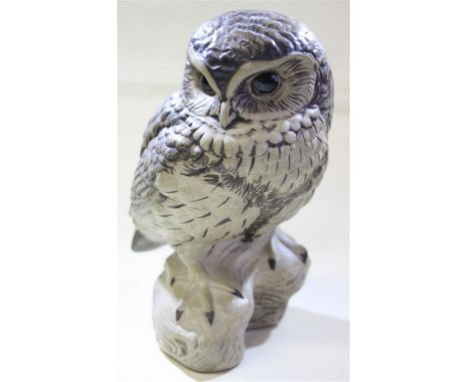 A Poole pottery stoneware owl by Barbara Linley-Adams.  Signed to the base.  17.5cms high.