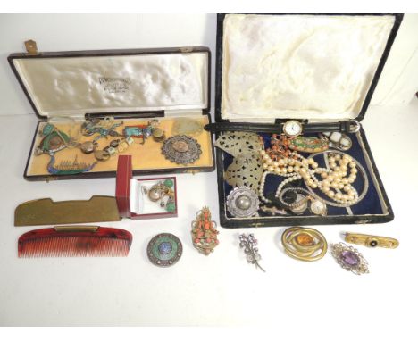 A nice collection of costume jewellery including two silver and coloured enamelled Thai dancer brooches, a similar longboat b