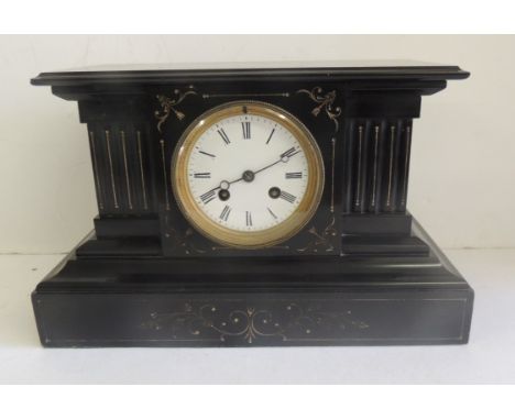 A 19th Century mantel clock by C J & Co., in architectural polished black slate case and having white enamel dial, two train 