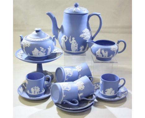 A Wedgwood Jasper ware coffee set.  Comprising of one coffee pot, cream jug, covered sugar bowl, six coffee cans, five coffee