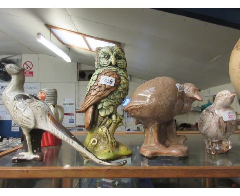 THREE STUDIO POTTERY GLAZED BIRD ORNAMENTS TOGETHER WITH A FURTHER RESIN MODEL OF AN OWL (4)