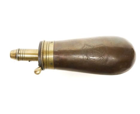 Sykes Patent copper and brass pistol size powder flask engraved with a shield device to the flask body. 15.5cm long