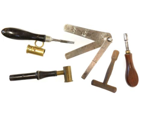 Five 19th century gun implements, to include a William Davis bore gauge, a nipple wrench, ring powder measure, nipple key for