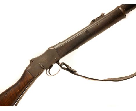 Martini Henry Mk IV .577/450 rifle, 32 inch barrel with folding ladder sight, the action stamped Enfield 1887, the stock and 
