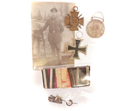 German Iron Cross and related items including a 1914-1918 cross, small roundell pin badge, Friedrich II Grossherzog Von Baden