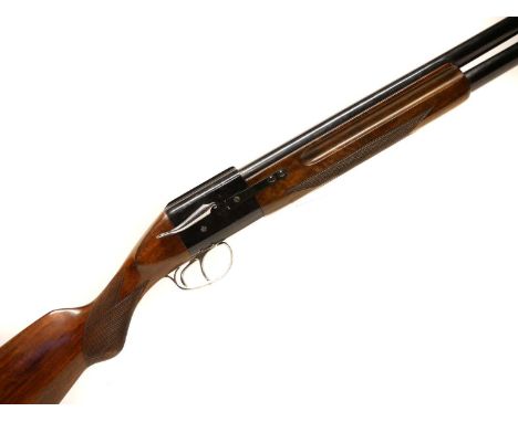 Brevete Baby Bretton 12 bore over and under shotgun, 28 inch barrels choked to 1/4 and full, slide action breech, extremely l