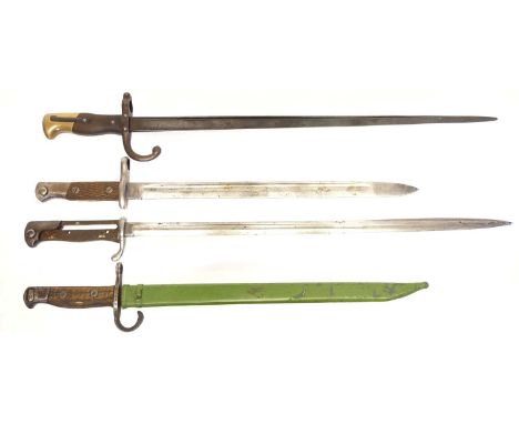Four bayonets, to include:Chinese made Japanese Type 30 bayonet and scabbard, unmarked except for a three-circle arsenal mark