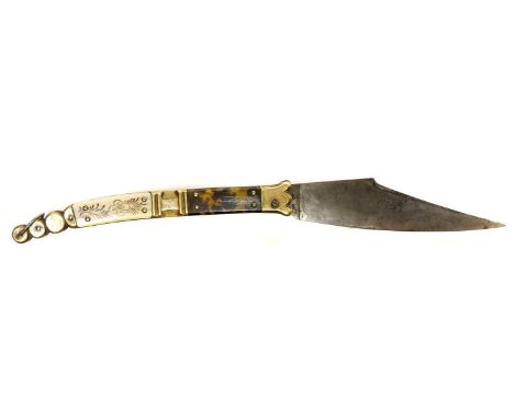 Folding Navaja knife, the blade with maker's mark Girodias, the shaped brass grips with ivory and tortoiseshell inserts.34.5c