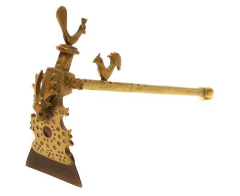 Tibetan brass Adze, the steel blade fitted into brass mount decorated with stag head and cockerels. 25cm long