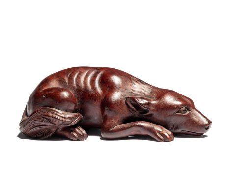 TWO JAPANESE CARVED WOOD NETSUKE OF A HOUND AND A DEER, 20TH CENTURY each carved recumbent, the head resting between the fron