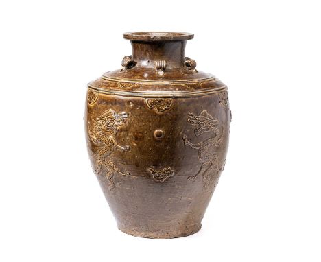 A LARGE CHINESE MARTABAN OLIVE-GREEN GLAZED 'DRAGON' JAR, 16TH CENTURY the baluster body rising from a recessed base to an an