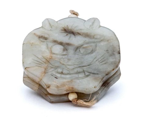 A CHINESE CELADON JADE 'EIGHT TRIGRAMS' PENDANT, QING DYNASTY, 19TH CENTURY carved to the front face with the head of a felin